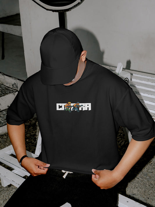 Model wearing Contra 240 GSM Best Oversized T-shirt - Pudinaa